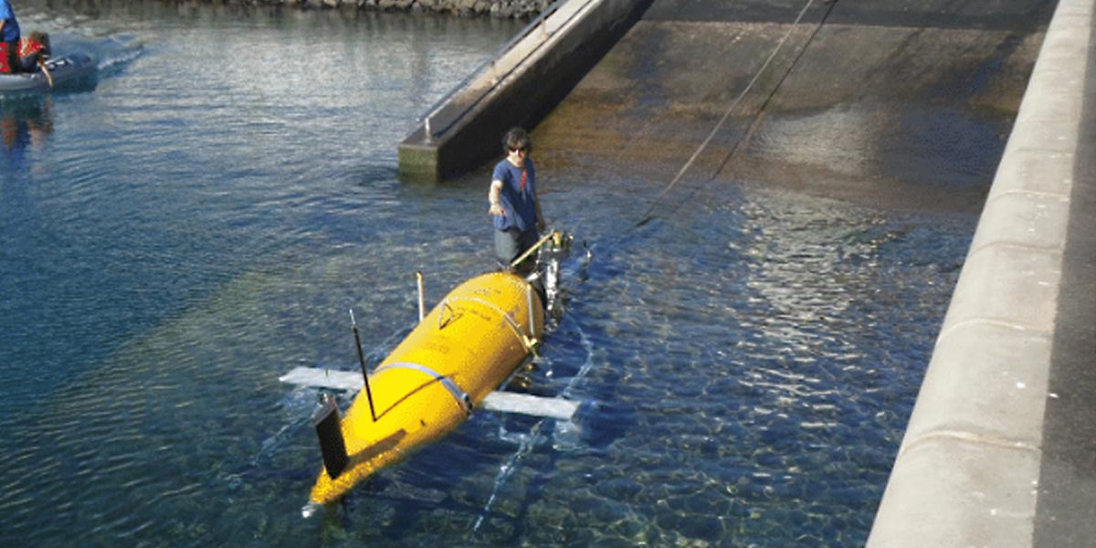 Dr. Miles Pebody helping to launch ALR from shore