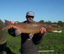 Large male salmon held By William Beaumont, GWCT (© Anton Ibbotson)