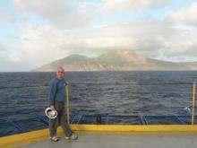 Martin Palmer with volcano in background