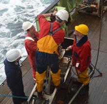 Henry Ruhl, Dave White, Brian Bett (NOC), Gordon Paterson (NHM) prepare the box corer for deployment