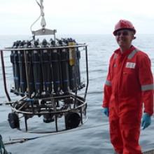 Doug Connelly deploying the *conductivity, temperature, depth (CTD) package into a calm Bransfield Strait 