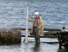 David Pugh doing what he enjoyed most – making temporary sea level measurements (in the Falkland Islands in 2009). Photograph by Philip Woodworth.