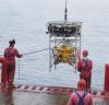 Robot carrying seismic recorder is launched towards the seabed