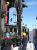 Engineers carrying out tide gauge repairs