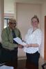 UB’s President Professor Emeritus Clement Sankat and the NOC's Stacey Felgate at the signing